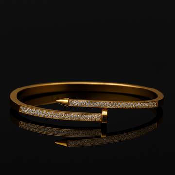 Gold bracelet with diamond accents on a black background