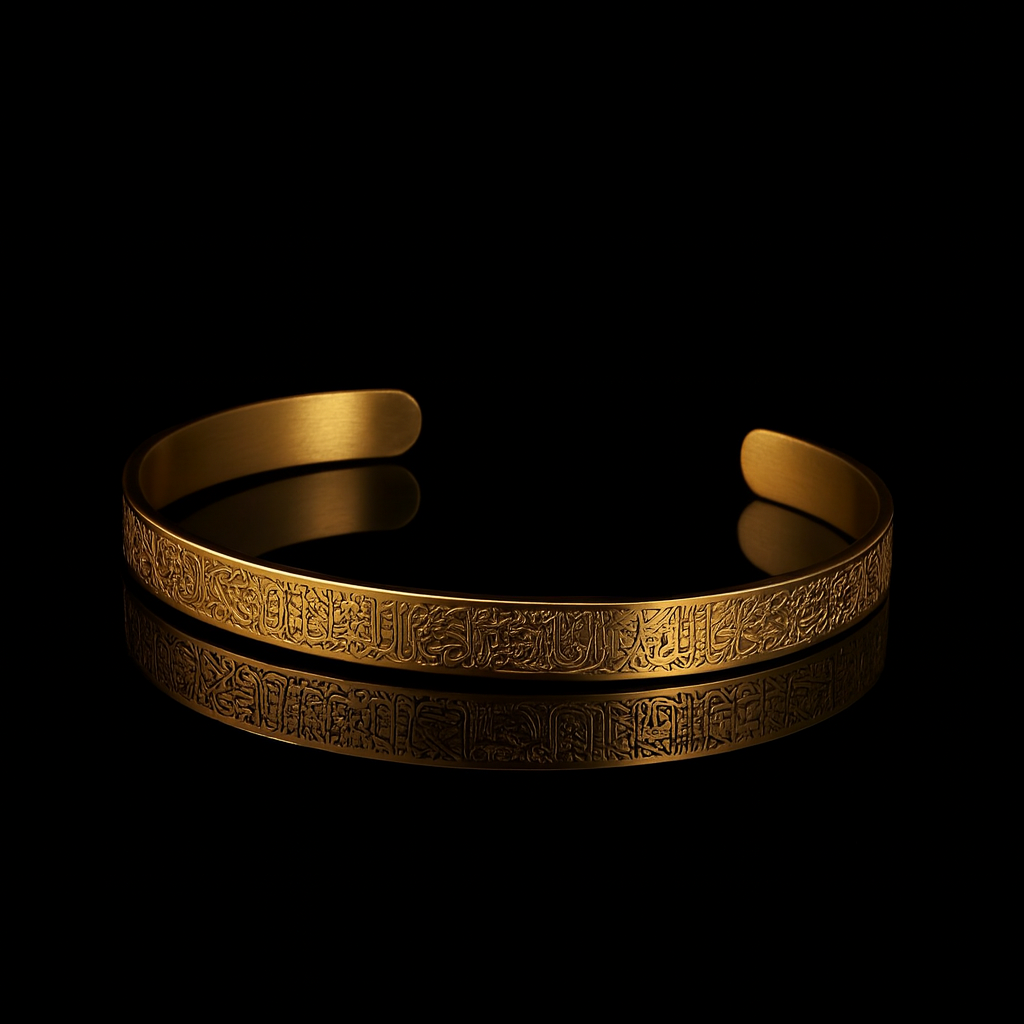 Gold bracelet with intricate designs on a black background